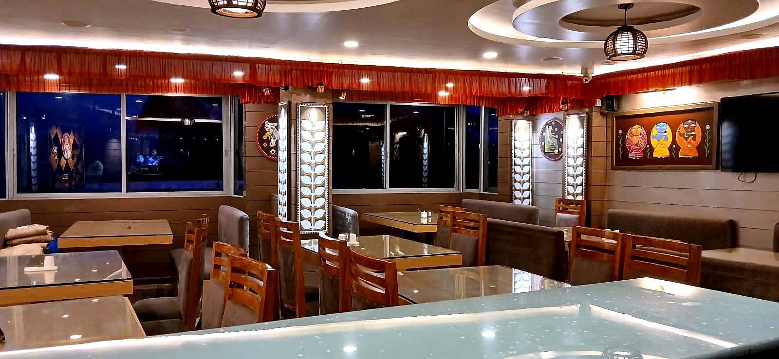 The dining room at Clubside Restaurant, tables laid